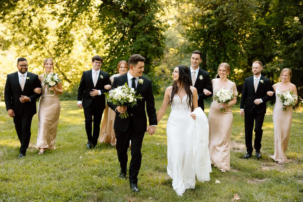 image of a couple and their entourage.
