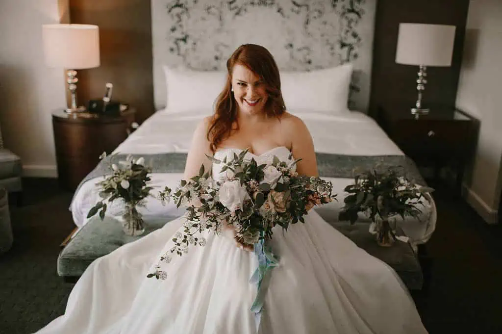 bride-posing-in-her-wedding-dress