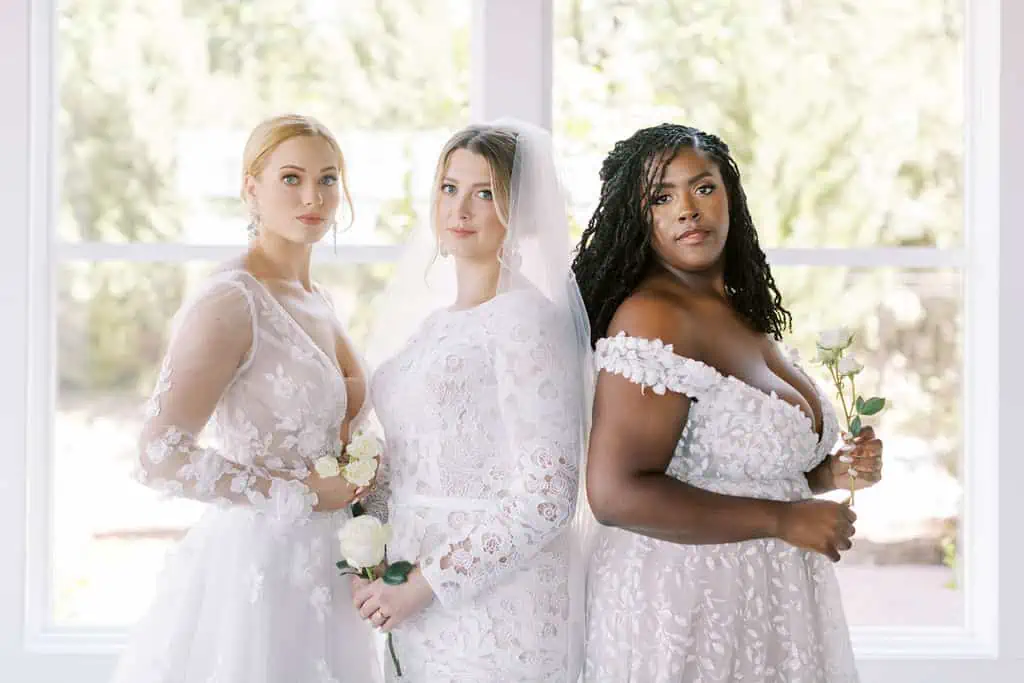 Models wearing Savvy bridal wedding gowns