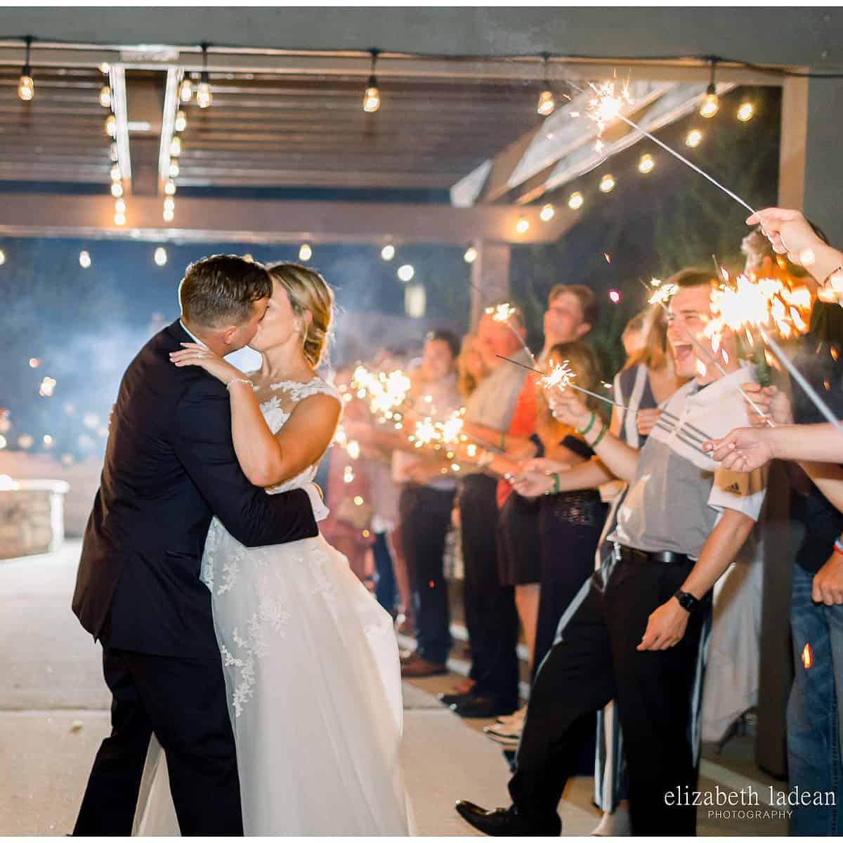 groom dancing with bride wearing wedding reception dress