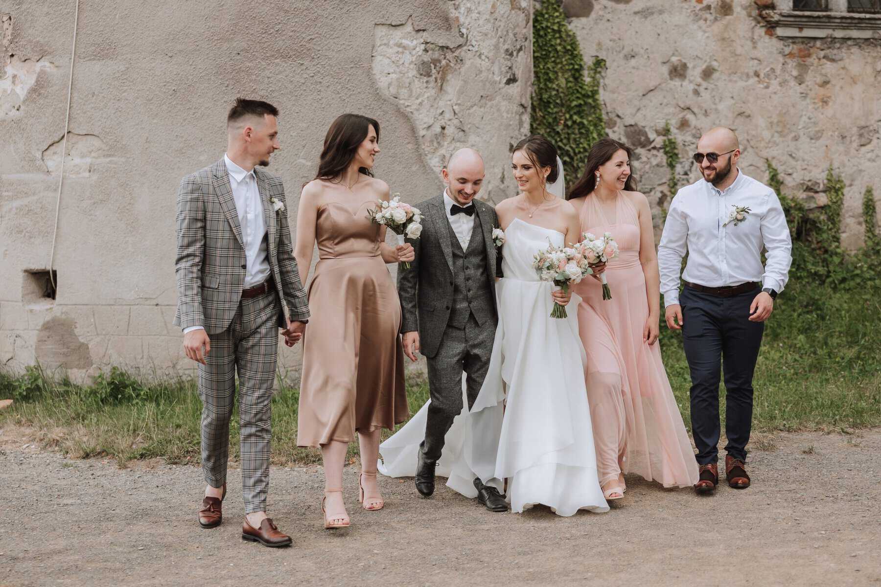 bride surrounded by family wedding guests