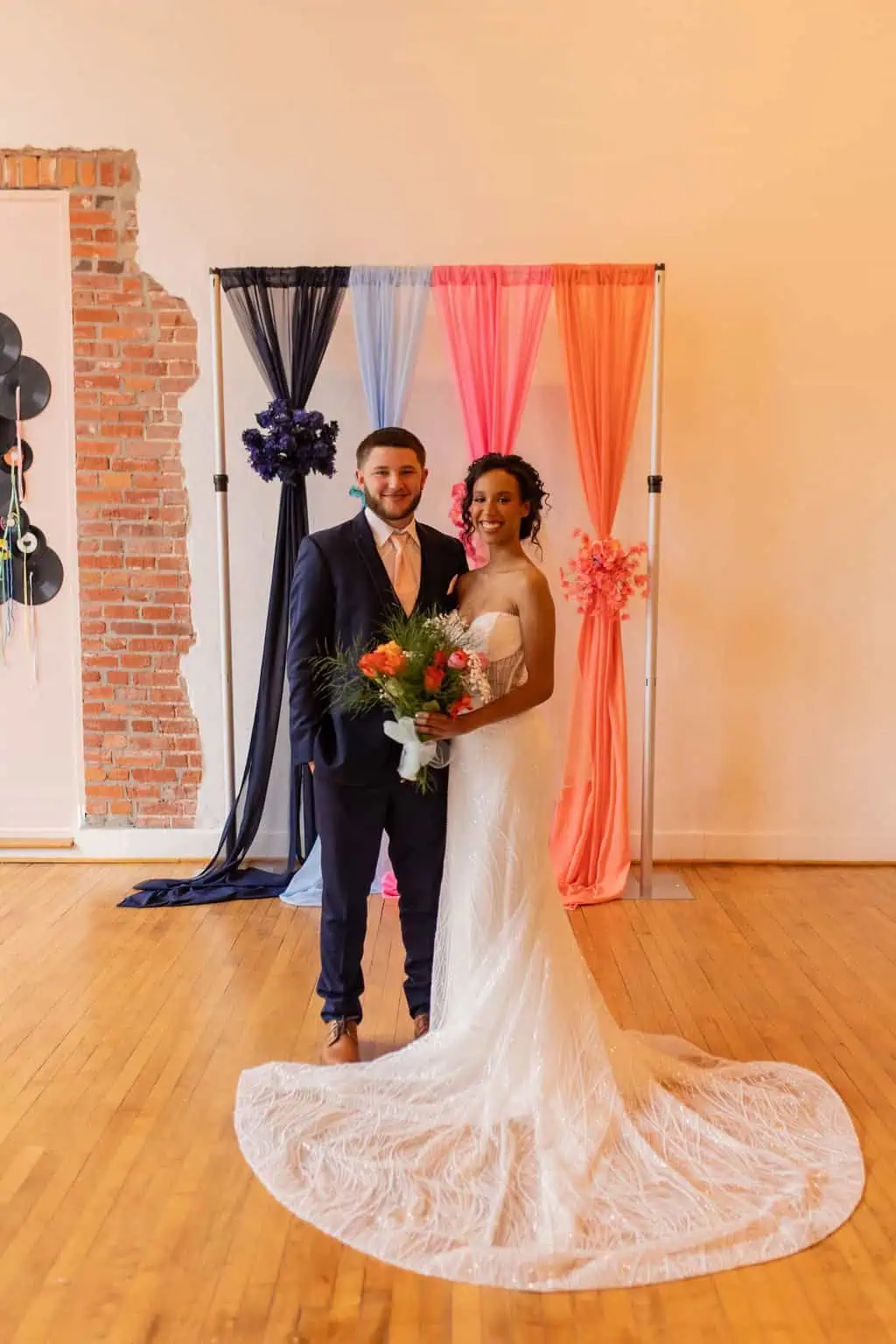 The bride wear a Carter by Evie Young wedding dress