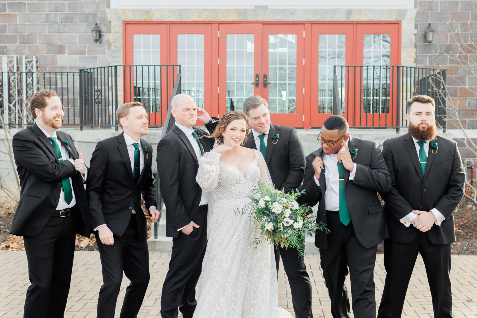 bride and groom with their groomsmen