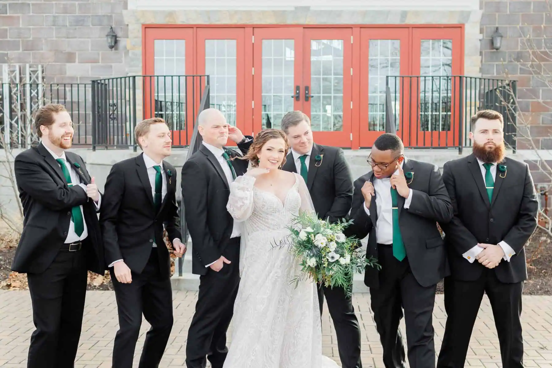 bride and groom with their groomsmen