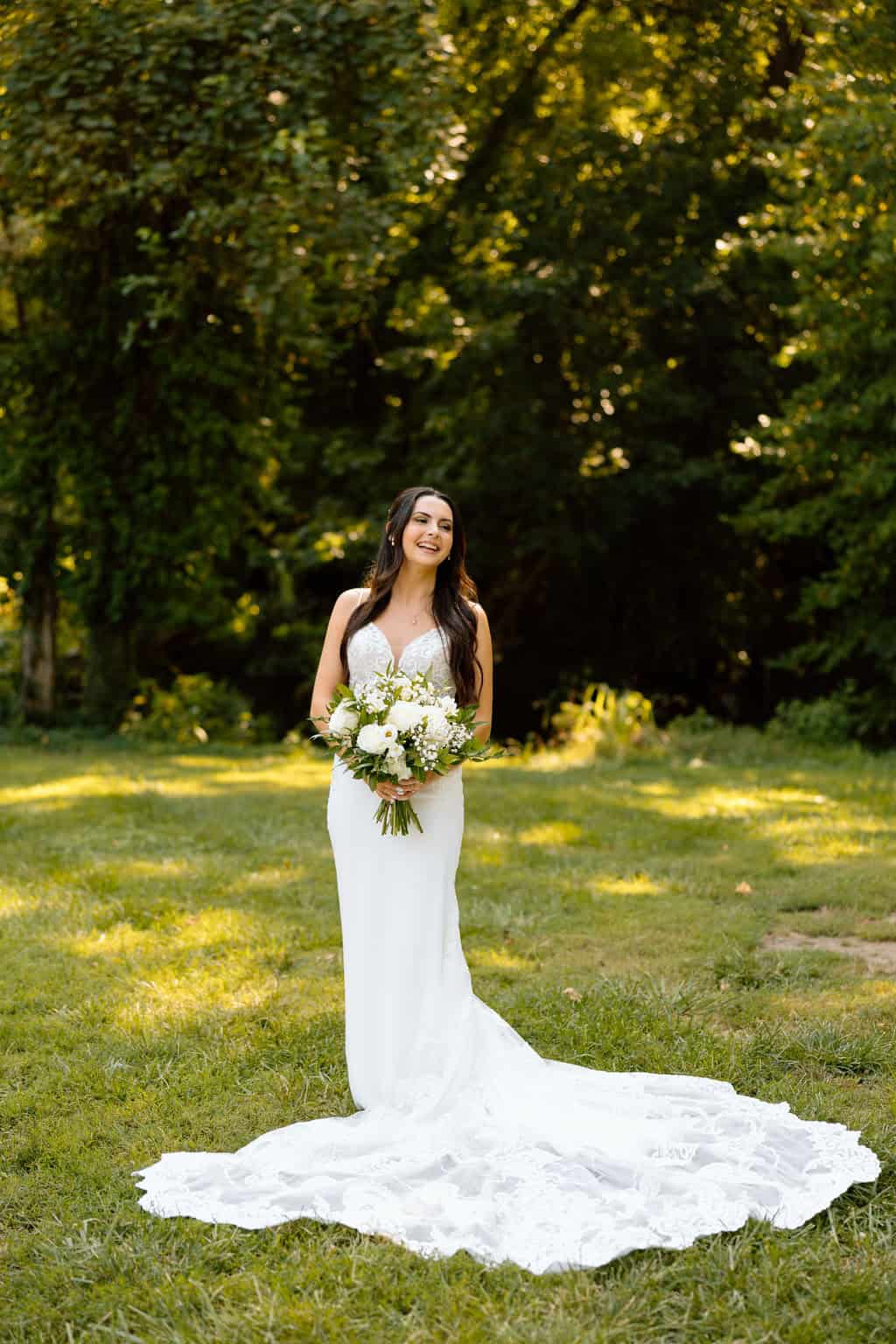 image of a happy bride on her beautiful wedding dress