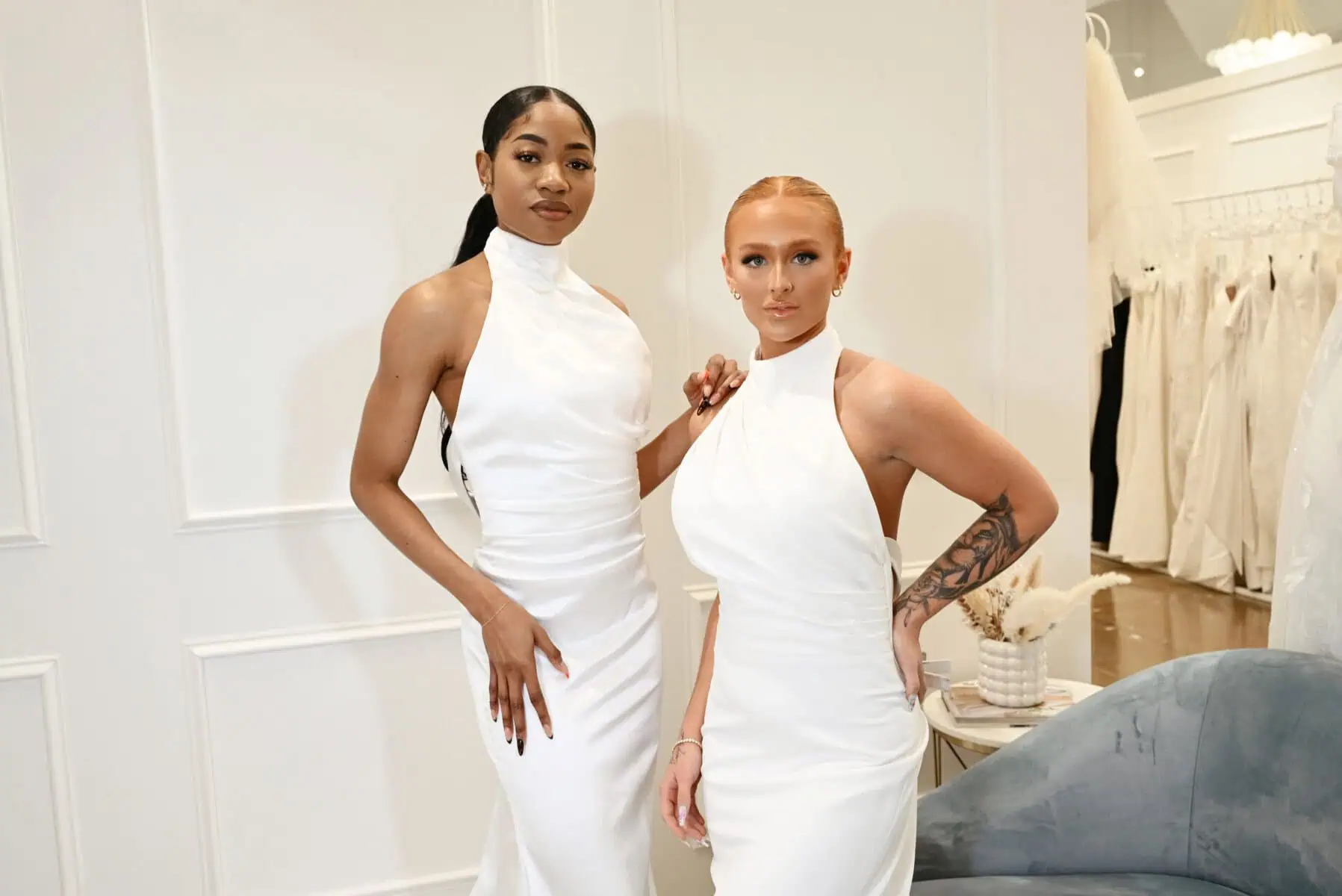 image of two brides wearing a halter wedding dress