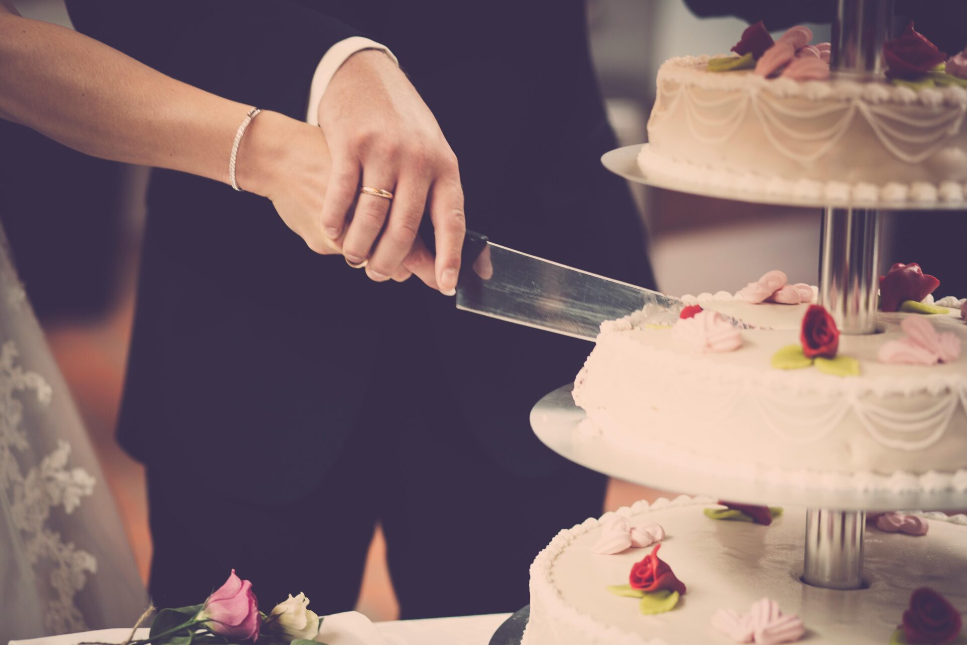 cutting a wedding cake.