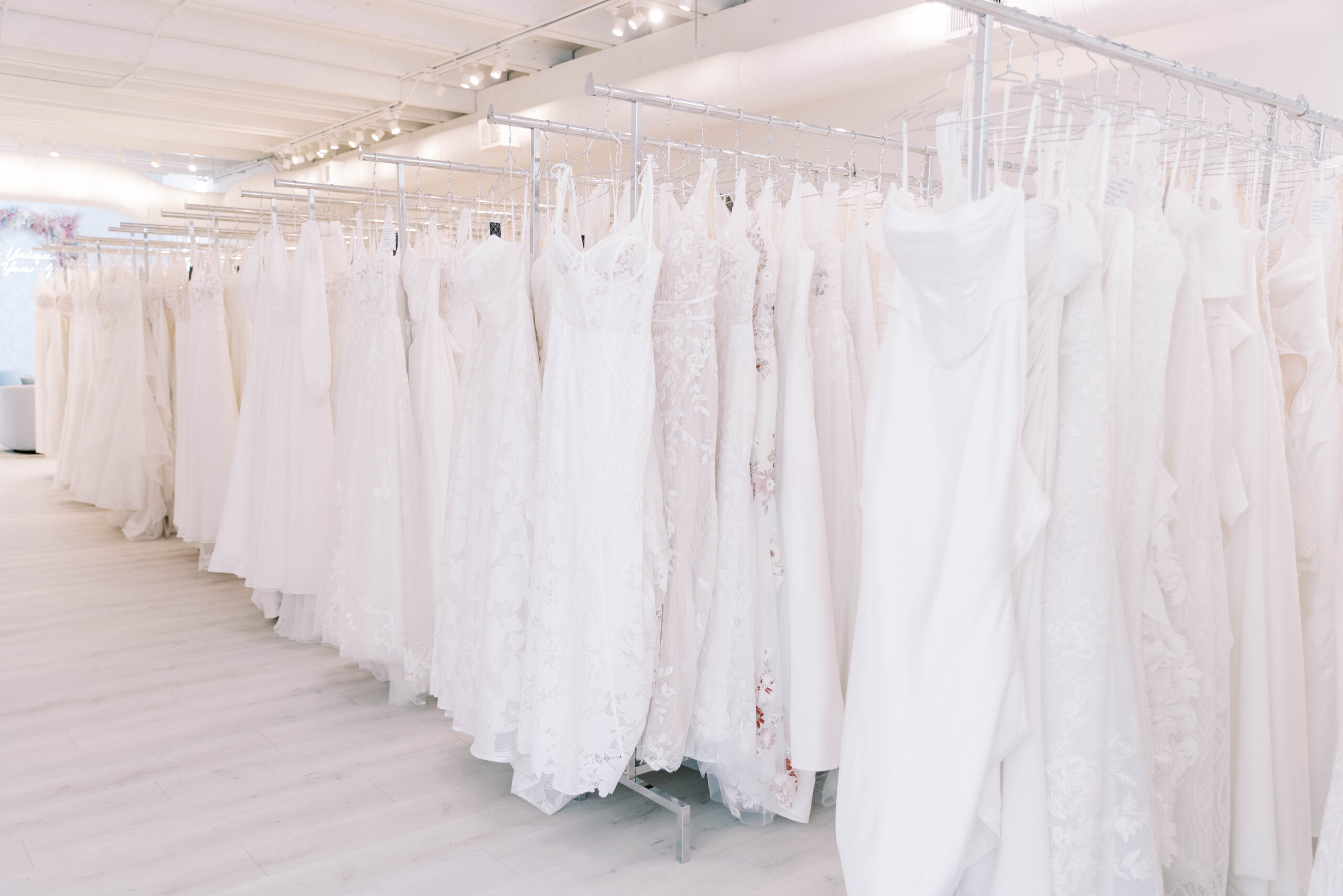 wedding dresses on the rack