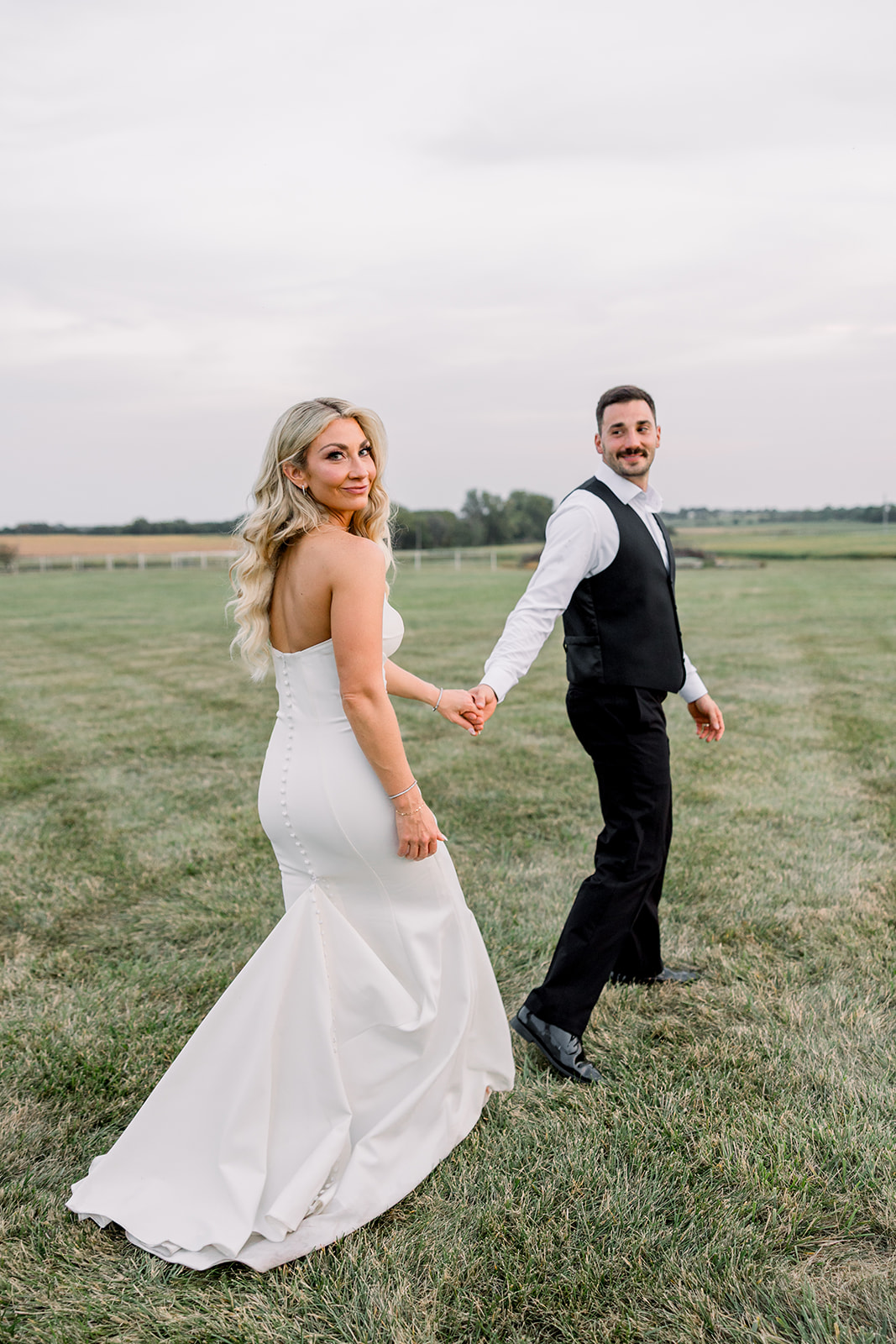 walking while holding hands in the beautiful cinematic view.