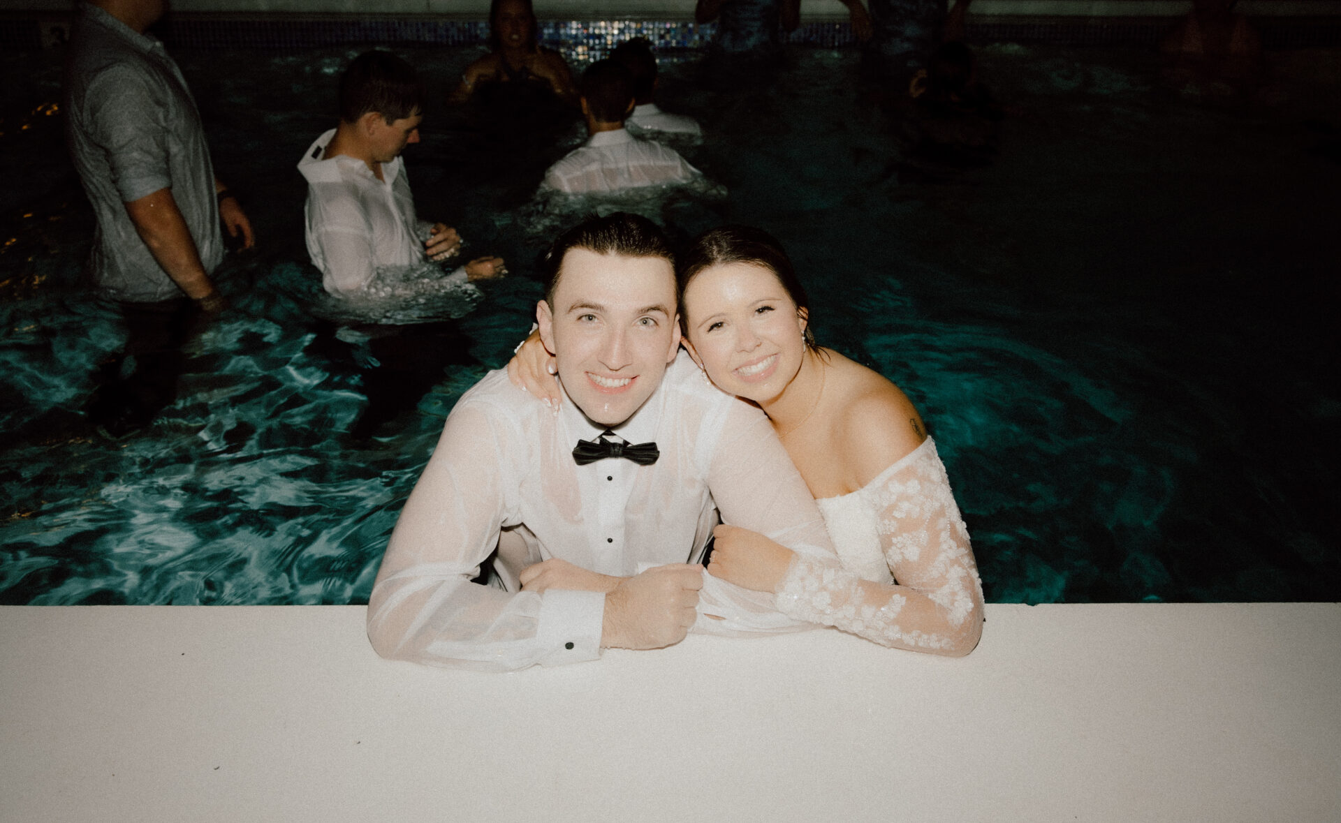 Ryan and Lauren ended the night with a splash. They jump into the pool in their formal attire.