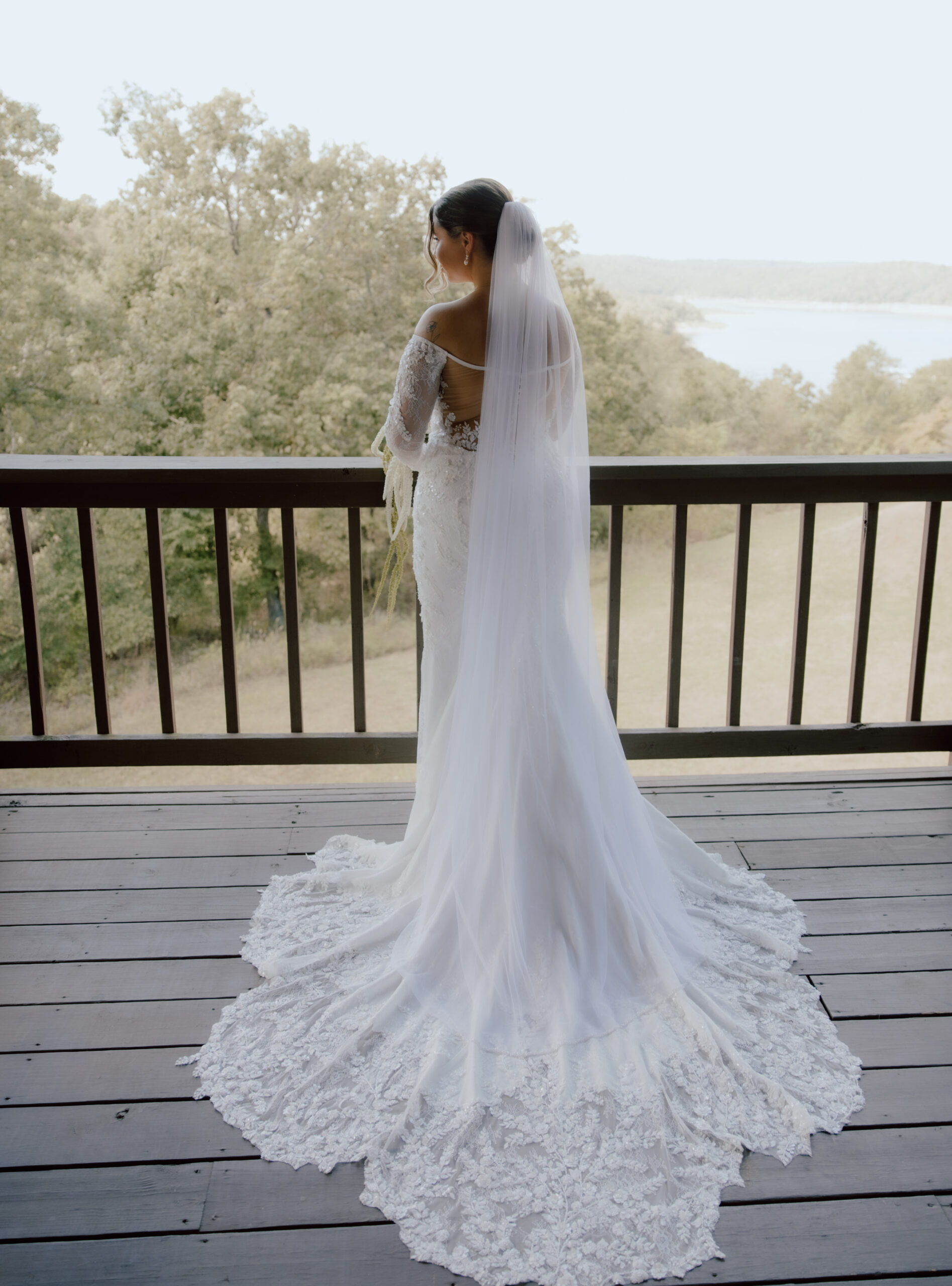 portrait image of bride showing her long beautiful veil.