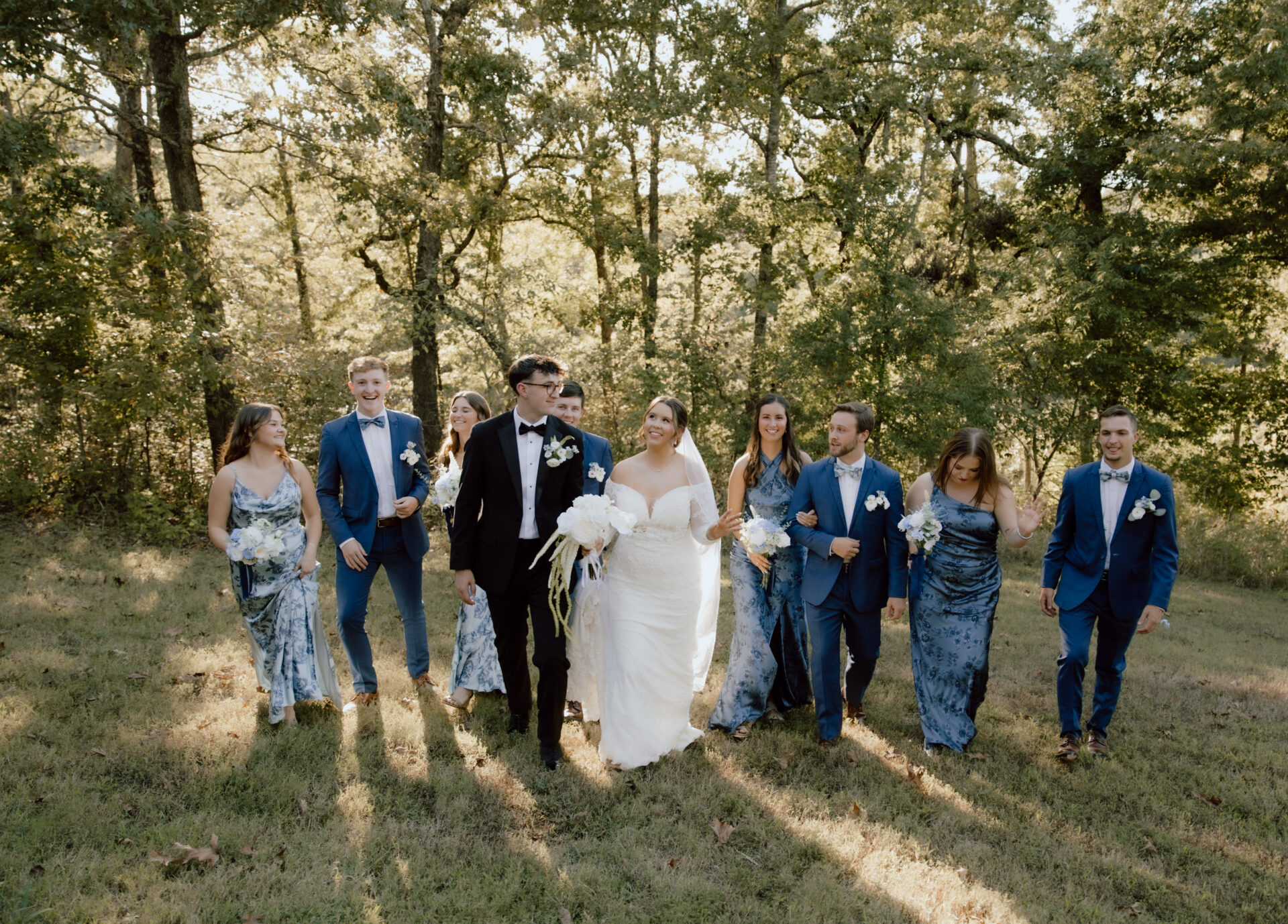 The couple and their entourage. Captured beautiful moment under the shades of beautiful trees.