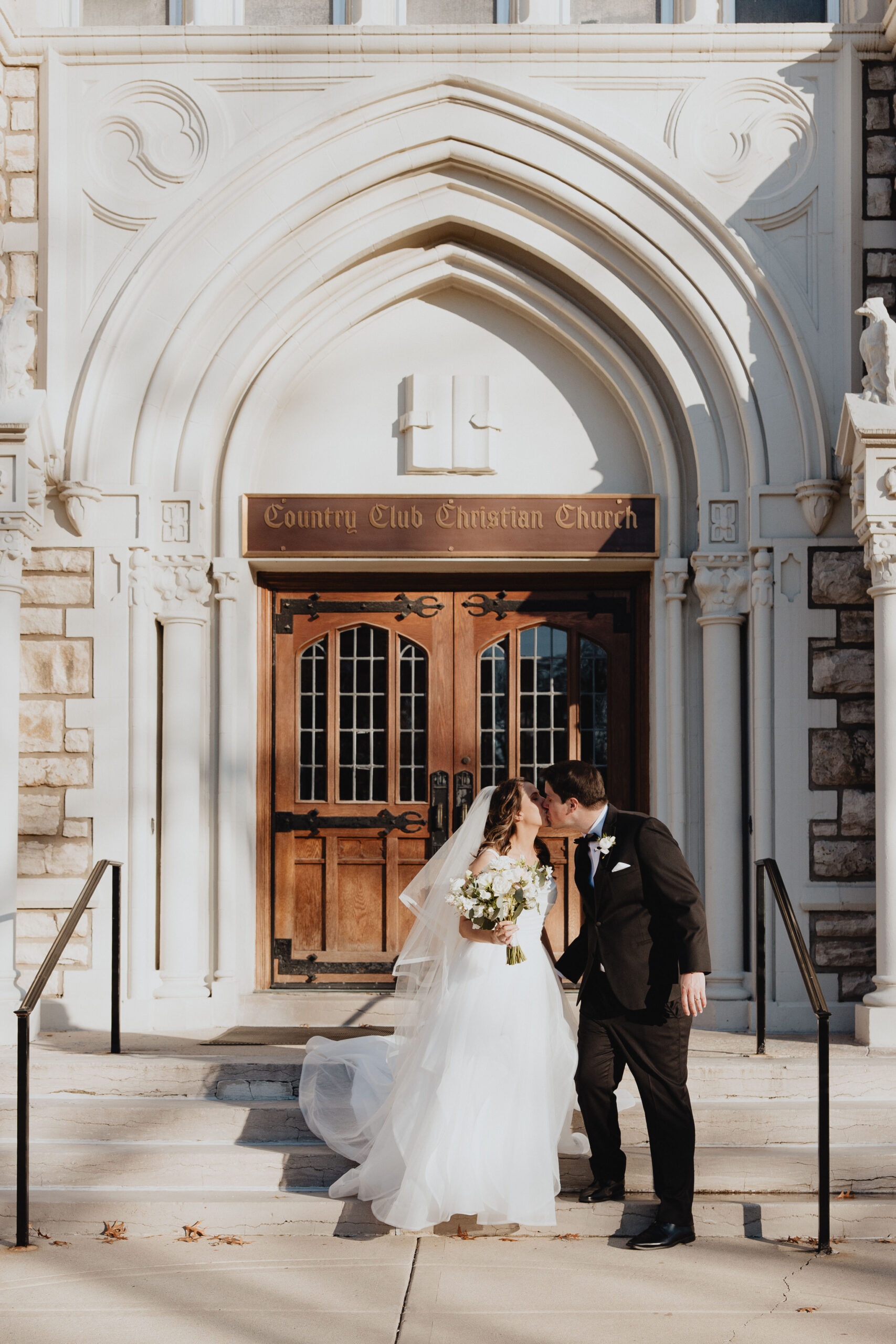 Caroline and Dave portrait session outside the church front door.