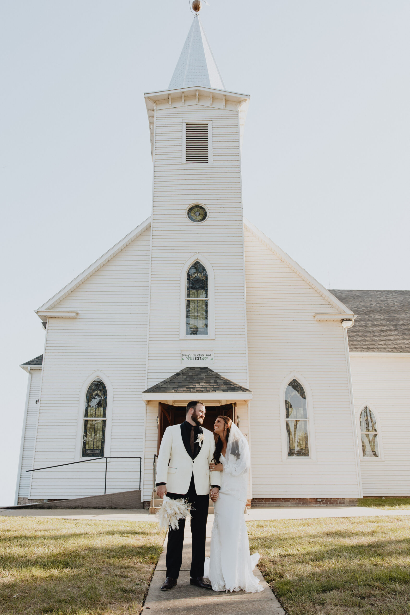 Kelsey and Colby began their forever at a beautiful, classic white-steepled church.