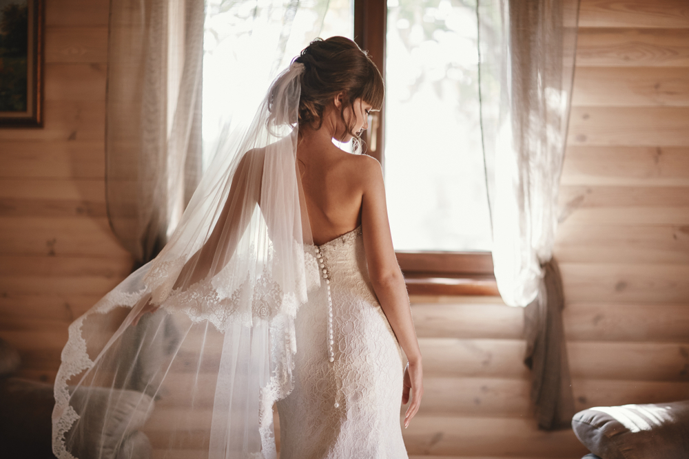 Bride with detailed embroidered veil