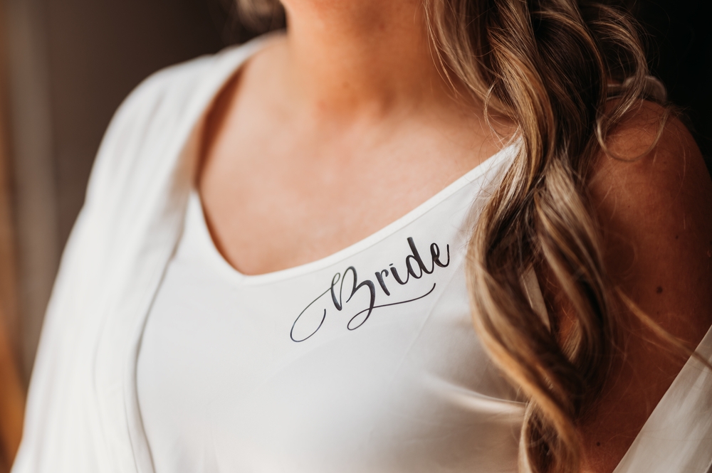 Closeup of bridal undergarments and bridal shapewear with the word "bride" on them.