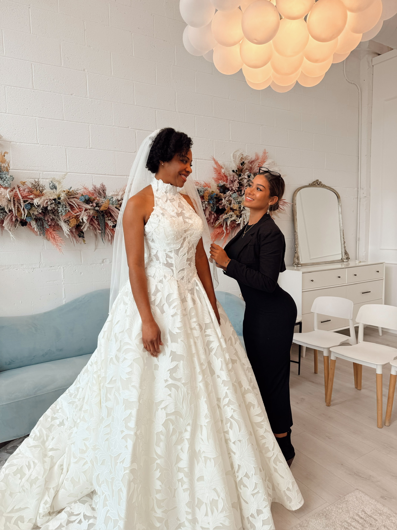 Trendy bride at wedding dress appointment, dress fitting