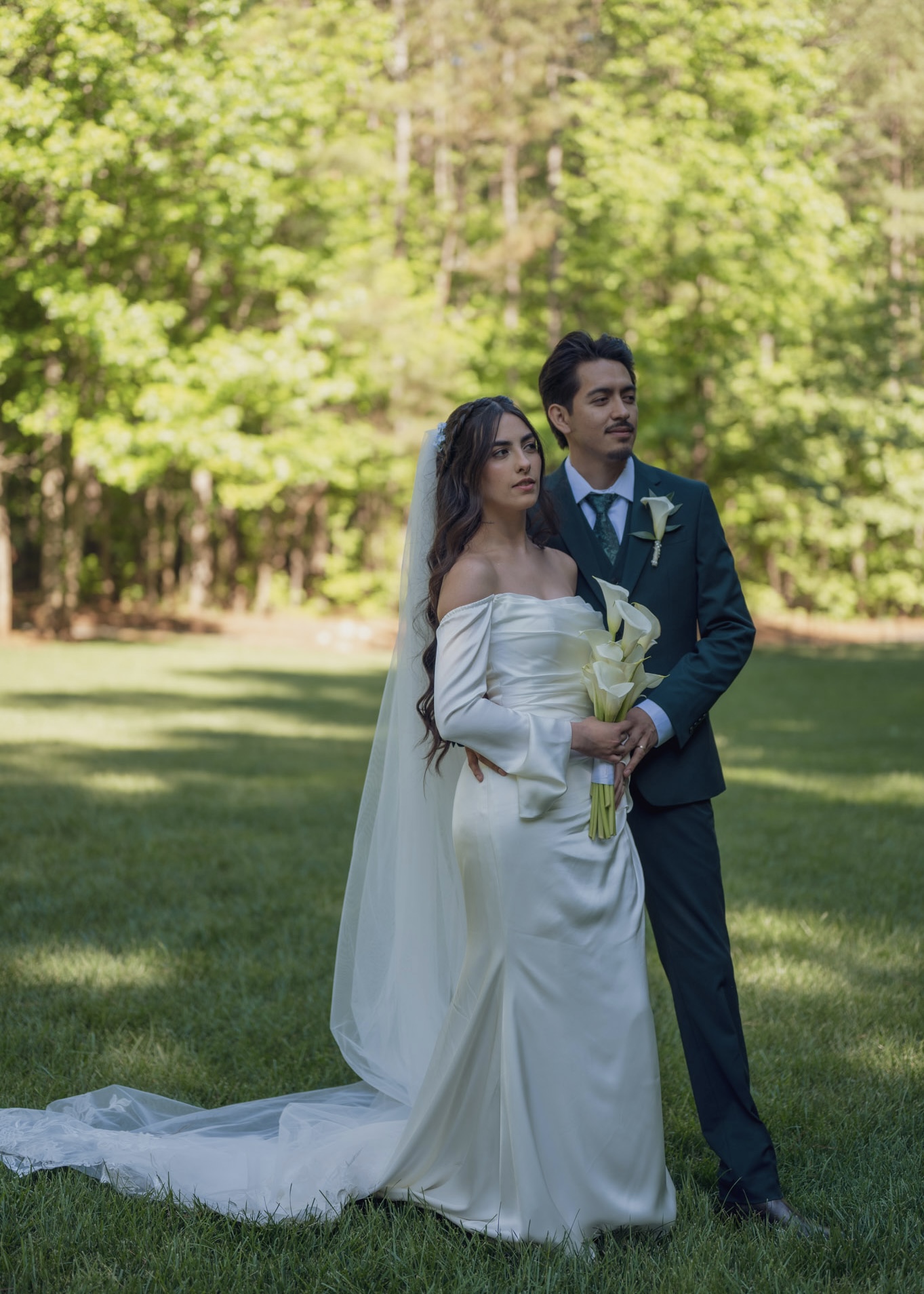 Savvy Bride Brenda Full-length bridal portrait with veil in the field with groom Saul in full army green tuxedo.