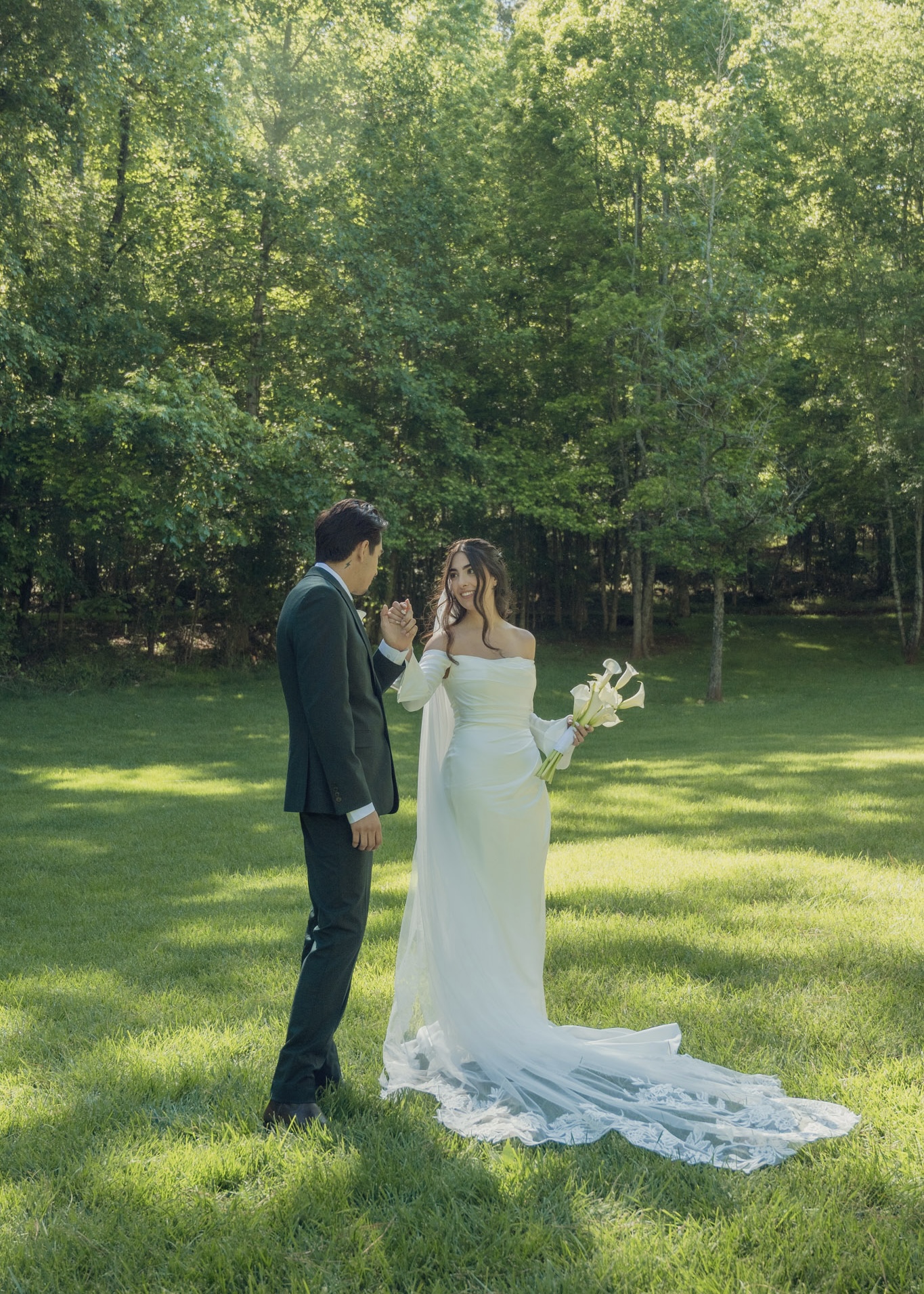 Couple holding hands in the meadow