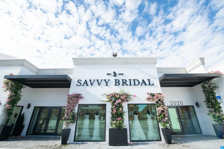 Savvy Bridal Fort Lauderdale storefront with luxury bridal boutique entrance, floral displays, and designer wedding dresses showcased in the front windows.