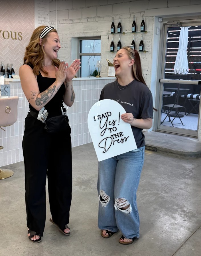 Excited bride and Savvy Bridal stylist celebrate a joyful “Yes to the Dress” moment during her bridal appointment.